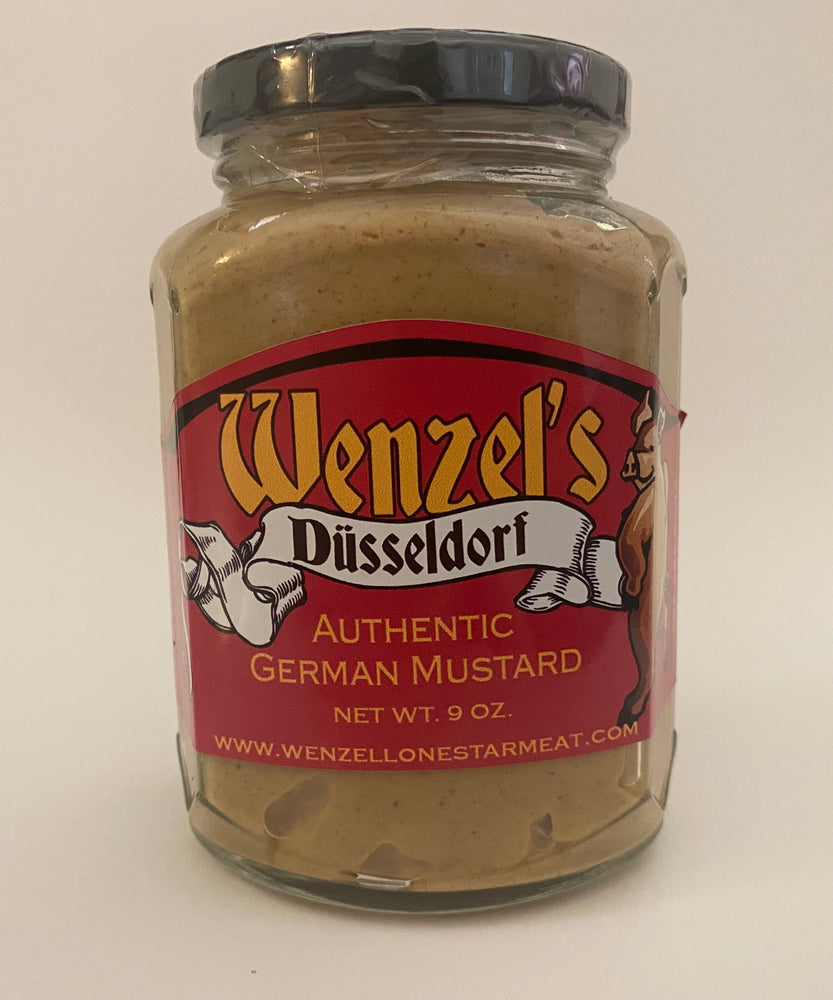 A 9 oz glass jar of Wenzel's Düsseldorf Authentic German Mustard with a red label and black lid, photographed against a plain off-white background.