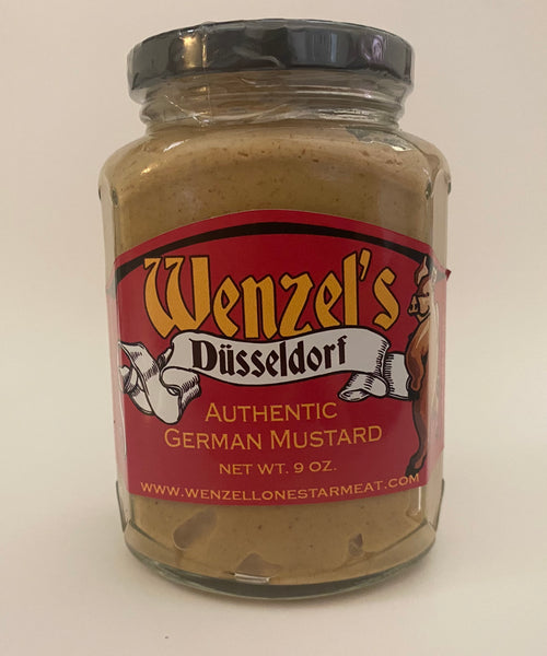 A 9 oz glass jar of Wenzel's Düsseldorf Authentic German Mustard with a red label and black lid, photographed against a plain off-white background.